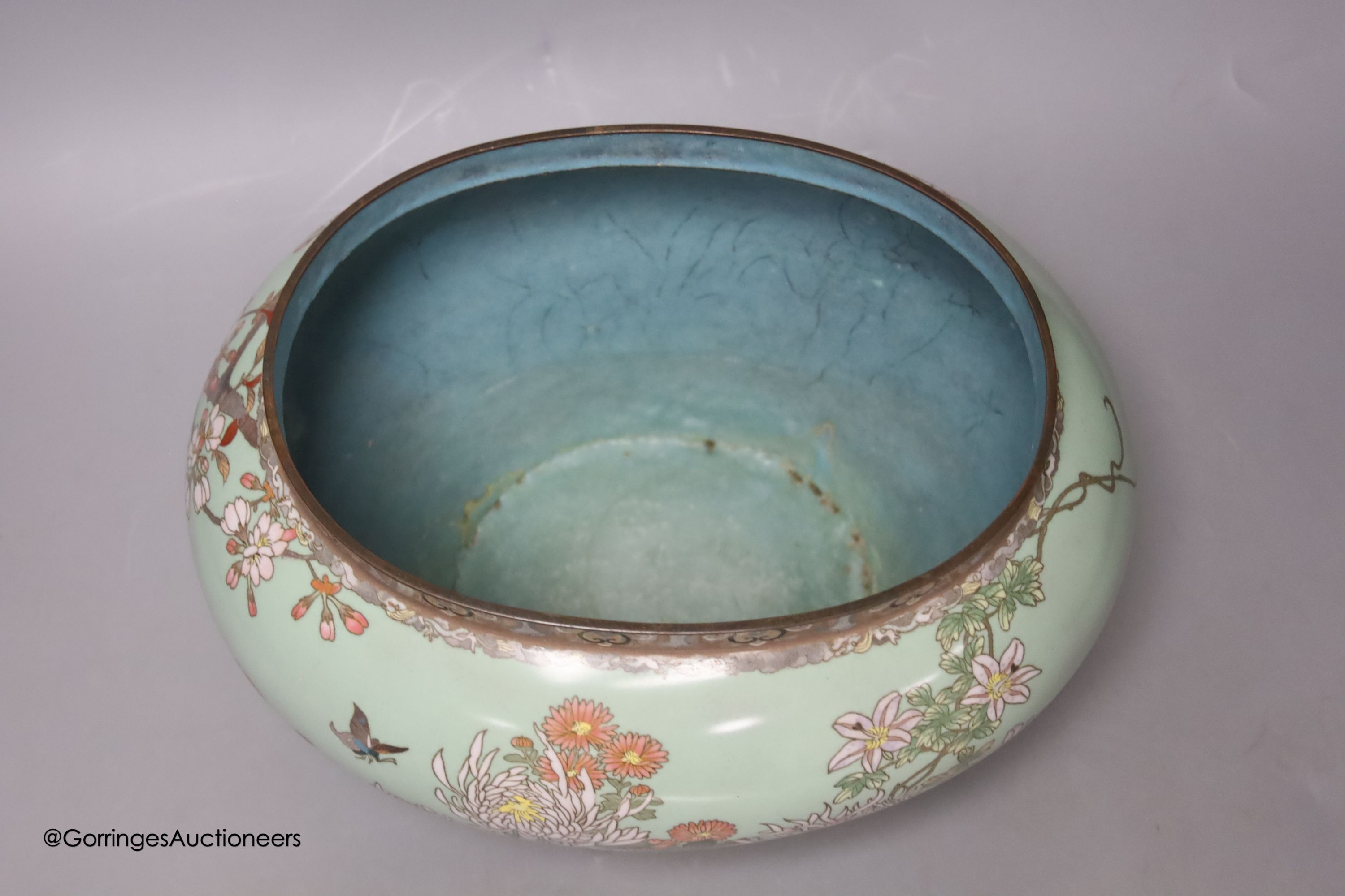 A large Japanese blue ground cloisonne bowl, height 19cm, 28cm wide